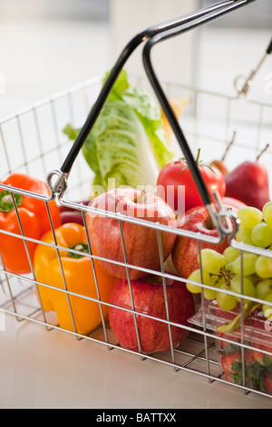 Shopping bag with vegetables and fruits on white background Stock Photo ...