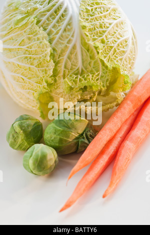 Bunch of carrots, brussel sprouts and cabbage Stock Photo