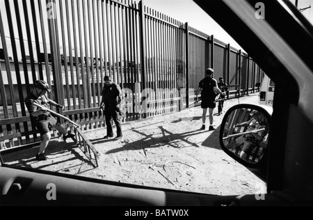 US Mexico border Calexico USA US Border Patrol agents break up a home-made ladder used to scale the border fence Stock Photo
