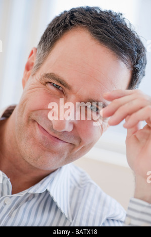Portrait of successful mature businessman smiling Stock Photo