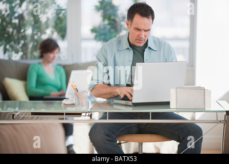 Mature man working from home Stock Photo