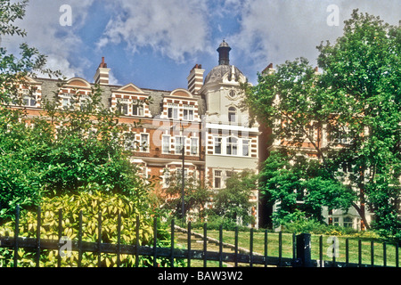 Buildings and gardens by the Regents Canal at Regents Park London England UK Stock Photo