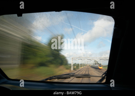 View from the cab on the Virgin Trains London to Manchester 0905 Class 390 Pendolino tilting train Stock Photo