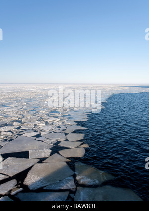 Edge of breaking and melting sea ice at Gulf of Bothnia at Spring thaw  , Baltic Sea , Finland Stock Photo