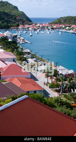 Red tin roof buildings surround Gustavia port St Barts Stock Photo