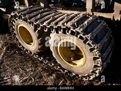 John Deere 1110D ECO III forwarder tyres with crawler treads installed Stock Photo