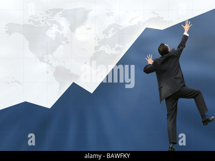 business man climbing graph up - success Stock Photo