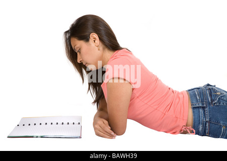 student studying on the floor Stock Photo