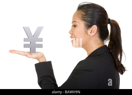 asian business woman holding a yen Stock Photo