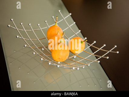 granadillas on a modern table Stock Photo