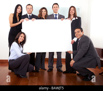 office team holding a cardboard Stock Photo