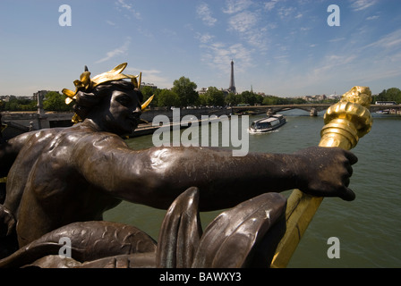 France, Paris, Banks of the Seine River listed as World Heritage by UNESCO, Statue on Alexander III Bridge and the Eiffel Tower Stock Photo