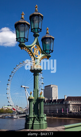 London Eye and Street Lamp on Westminster Bridge, London, England Stock Photo