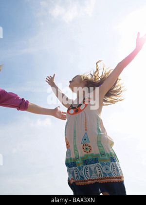 Young woman in motion Stock Photo