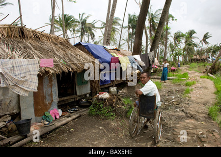 A survivor in a village near Bogale after cyclone Nargis struck Myanmar between the 2nd and 3rd of May 2008 and destroyed large Stock Photo