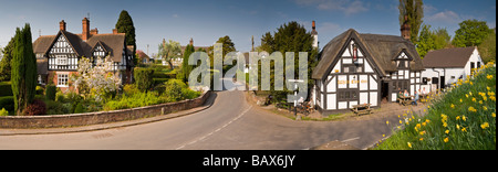 Panoramic View of the White Lion Inn and Village of Barthomley in Spring, Cheshire, England, UK Stock Photo