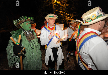 Mendip Morris Men lead the singing of the Wassail song during Thatchers Cider Wassailing event Stock Photo