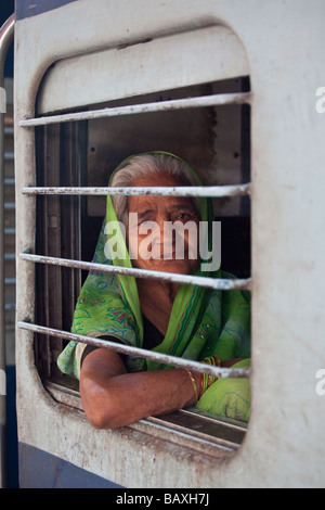 Elderly Woman on a Train at Agra Fort Railway Station in Agra India Stock Photo