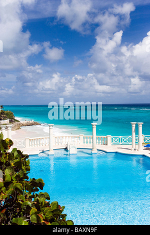 Swimming pool of the Crane Hotel, Atlantic Ocean in background, Barbados, Caribbean Stock Photo