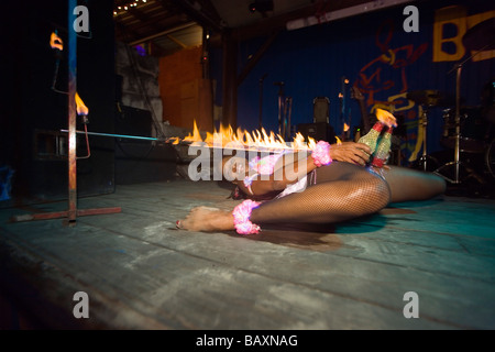 Female limbo dancer, Dinner Show in Harbour Lights Club, Bridgetown, Barbados, Caribbean Stock Photo