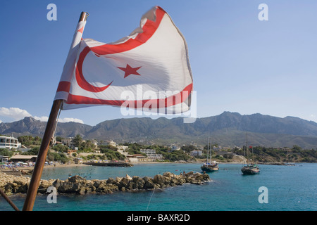 Neptun Pirate boat trip, by Kaleidoskop Turizm, and coast, with flag of the Turkish Republic of Northern Cyprus, Kyrenia, Girne, Stock Photo