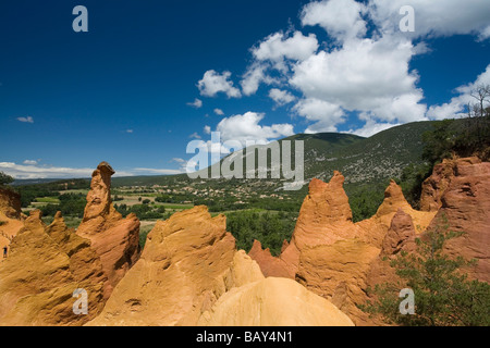 Colorado Provencal, rocks of ochre under a blue sky, Rustrel, Vaucluse, Provence, France Stock Photo