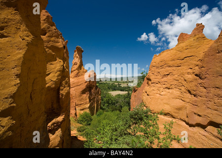 Colorado Provencal, rocks of ochre under a blue sky, Rustrel, Vaucluse, Provence, France Stock Photo