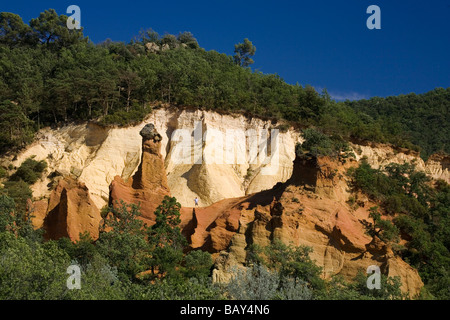 Colorado Provencal, rocks of ochre under a blue sky, Rustrel, Vaucluse, Provence, France Stock Photo