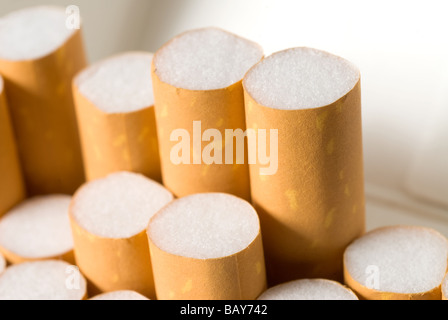 A pack of cigarettes with filters sticking up Stock Photo