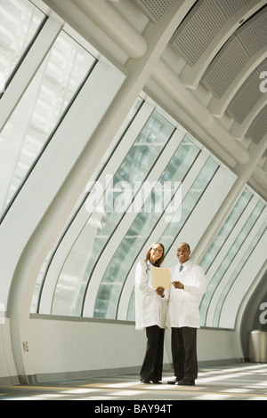 African doctors posing in corridor Stock Photo