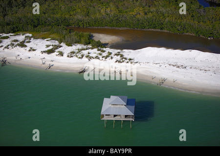 Abandoned house on stilts on the shore of Ten Thousand Islands National Park, Florida, USA Stock Photo