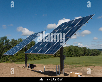 Solar panels installed on roof of terra dwelling. Stock Photo