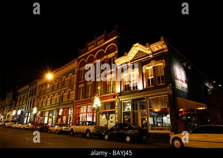 Heritage buildings at night on Lower Johnson Street in Victoria, British Columbia, Canada. Stock Photo