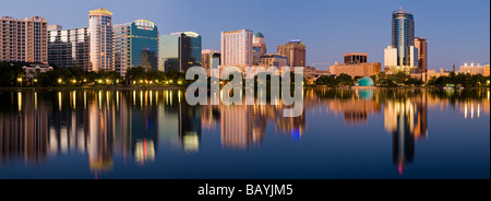 Downtown Orlando Florida skyline reflected in Lake Eola Stock Photo