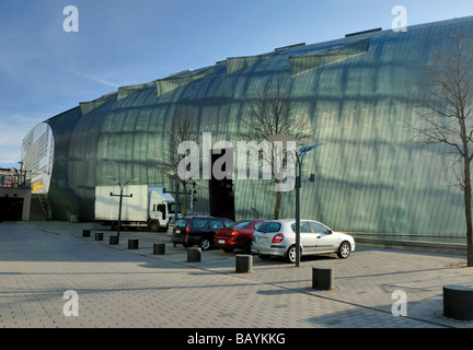 The window reflections of the main building of Helsingin Sanomat create interesting patterns on the surface of the building... Stock Photo