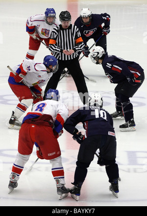 Face-off between Czech no 16 Ondrej Havlicek and US no 14 Kevin Lynch. Closest is Czech 8 Michal Poletín and US 10 Kyle Palmieri Stock Photo