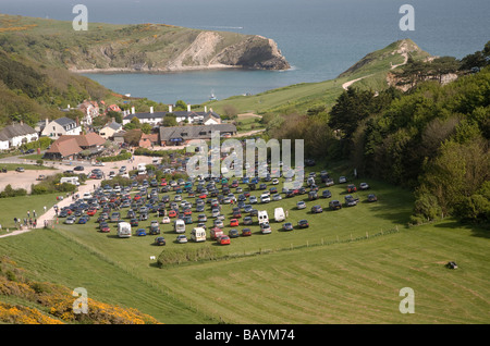 Crowded car park tourist honeypot site Lulworth Cove, Dorset, England Stock Photo