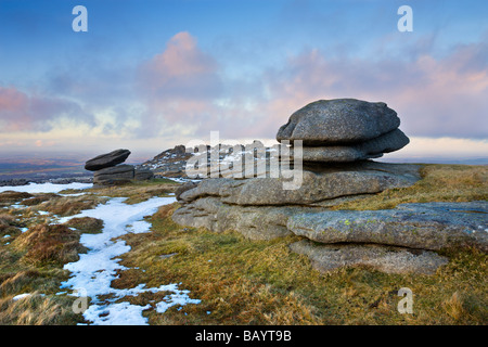 Melting snow on Belstone Tor Dartmoor National Park Devon England February 2009 Stock Photo