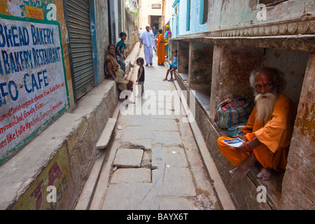 Sadhu Hindu Holy Man an Alley in Varanasi India Stock Photo