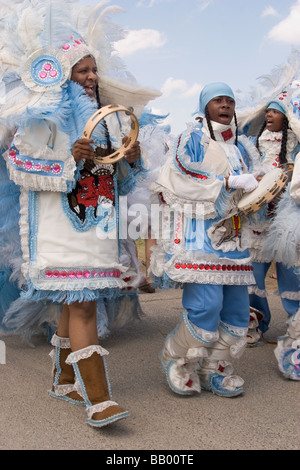 Mardi Gras Indians parading in their costumes at the New Orleans Jazz & Heritage Festival. Stock Photo