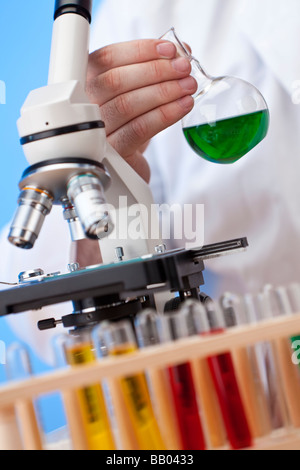 Environmental concept shot of a scientific researcher working in a laboratory and coming up with a green solution Stock Photo