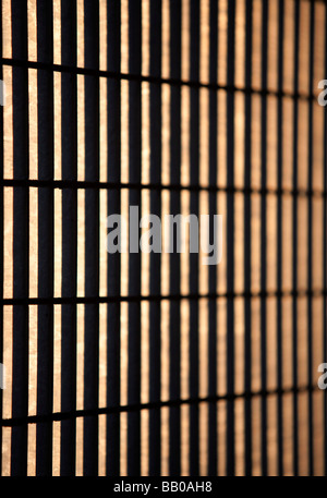 Metal mesh protecting window Stock Photo