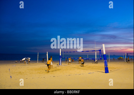 Locals playing footvolley  at sunset on Ipanema beach in Rio de Janeiro, Brazil. Stock Photo