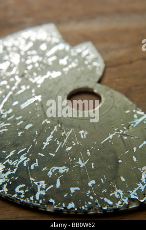 Battered and broken compact disc Stock Photo