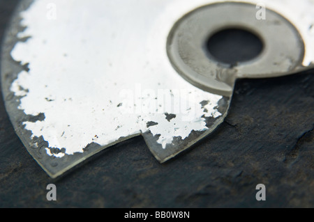 Battered and broken compact disc Stock Photo