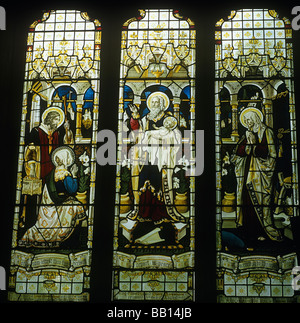 Stained glass window in St Mildred's church, Tenterden, representing Jesus being presented in the Temple, Stock Photo