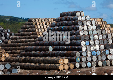 Old, wood, wooden, cask, container, Stacks of Whisky barrels at Speyside Cooperage, Visitor Centre, Craigellachie, Aberlour, Banffshire, Scotland Stock Photo