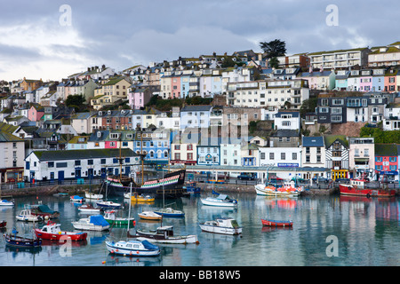 Fishing vessels and small yachts accompany the Golden Hind at anchor in Brixham Harbour South Devon England January 2009 Stock Photo