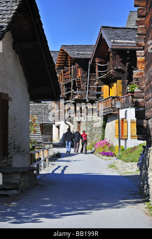 A view down a street in the Swiss village of Chandolin Stock Photo