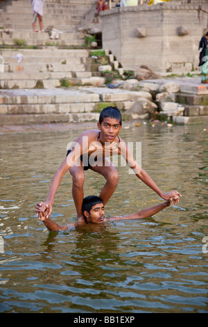 Swimming boy bathing in the Ganges, Varanasi Stock Photo - Alamy